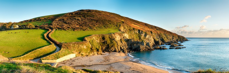 Southwest Coast Path as it passes Hemmick Beach near Gorran Haven on the south Cornwall coast resized